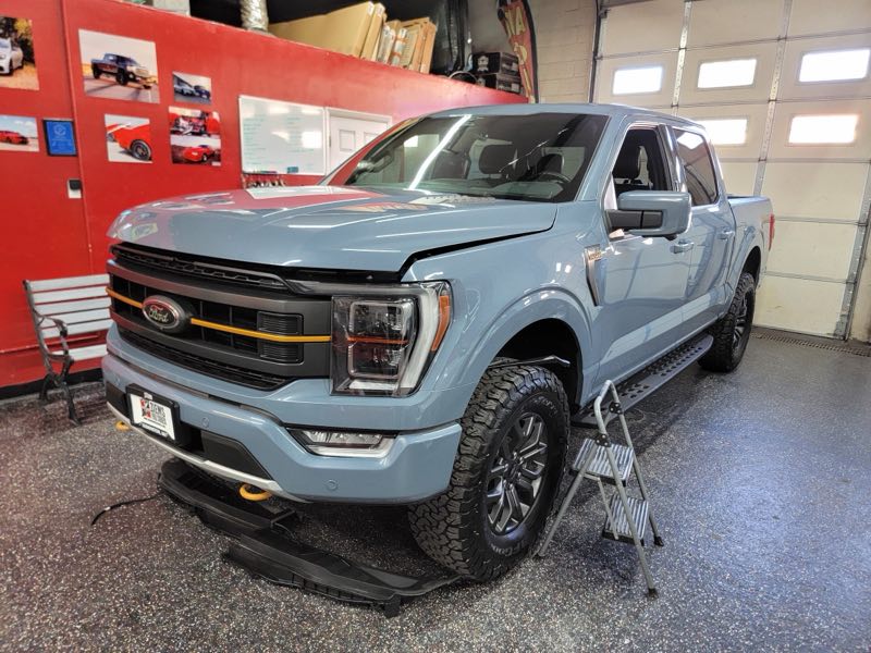 Ford F-150 in the shop for windshield replacement